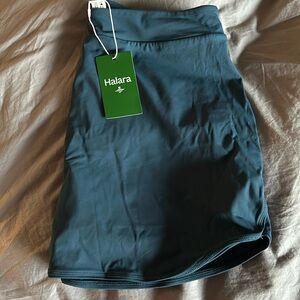 NWT Halara everyday skort in a blue green color size large, shorts have pockets